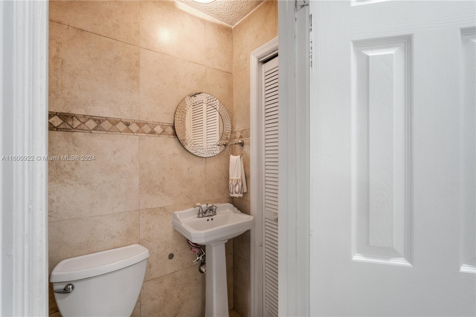 2245 Southwest 62nd Avenue Miami, FL 33155 - Photo 20 of 35 a bathroom with a sink toilet and shower