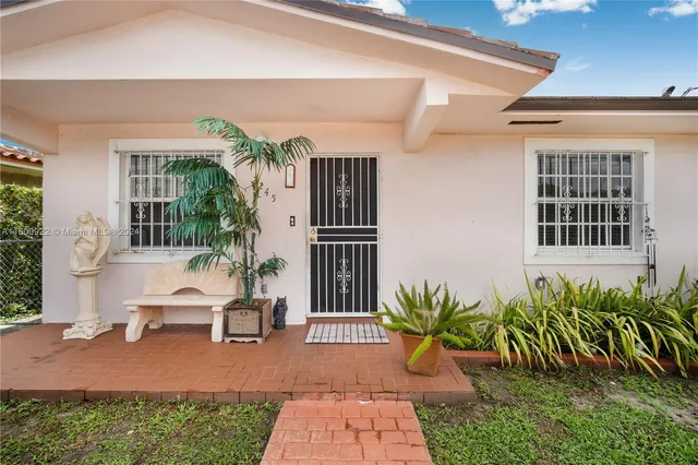 a house view with a garden space