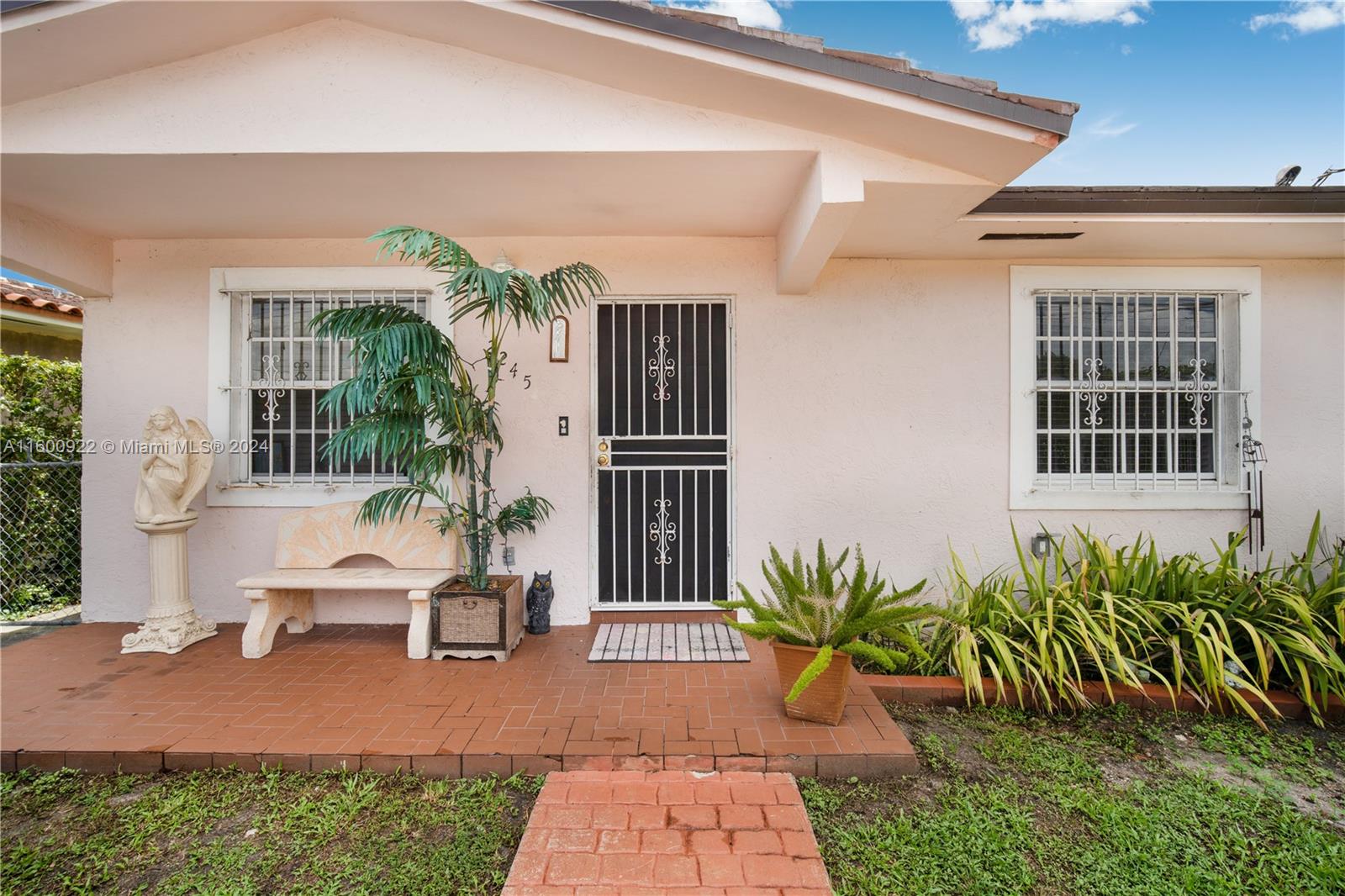 2245 Southwest 62nd Avenue Miami, FL 33155 - Photo 4 of 35 a house view with a garden space
