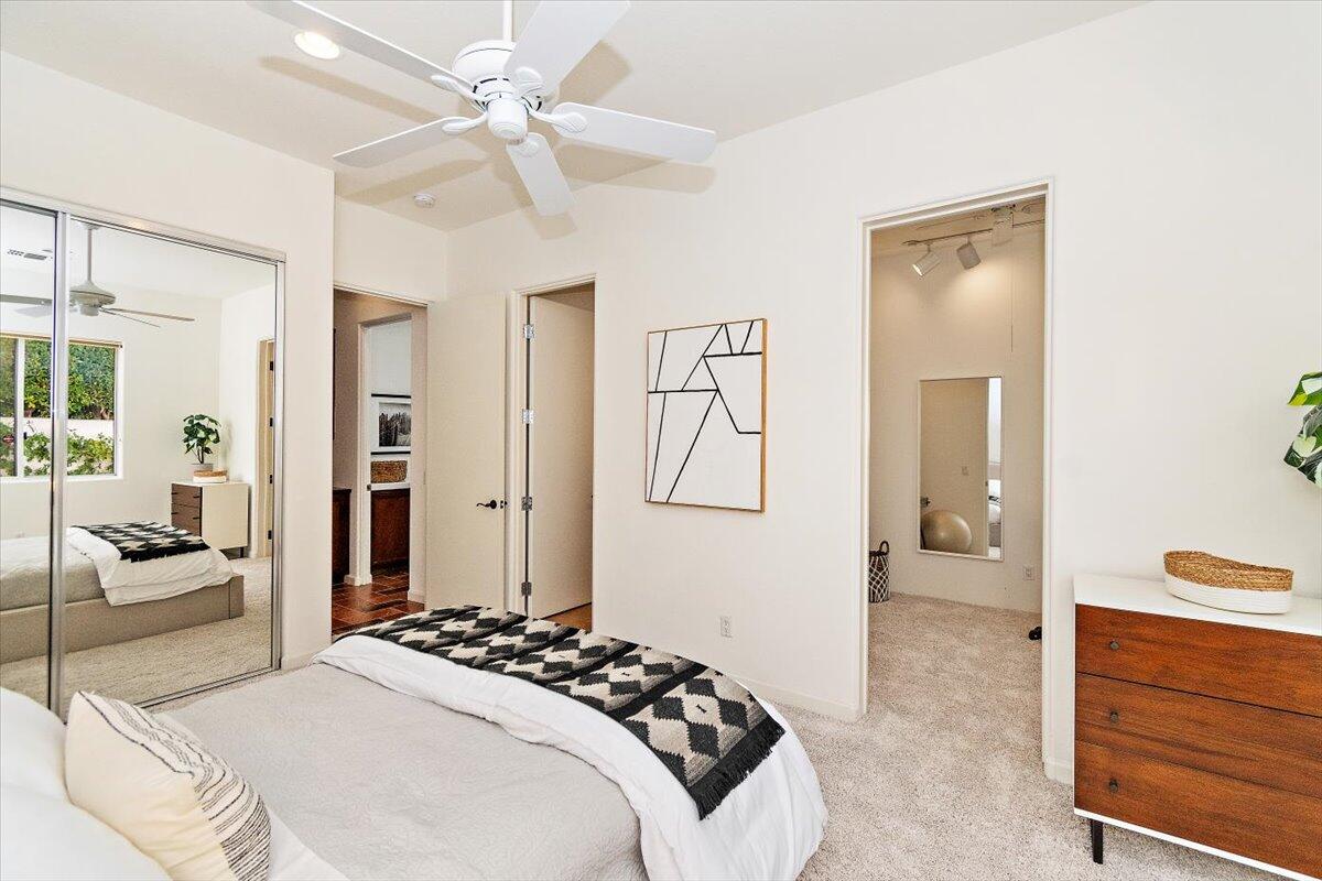 215 Loch Lomond Road Rancho Mirage, CA 92270 - Photo 29 of 57 a bedroom with a bed and a dresser