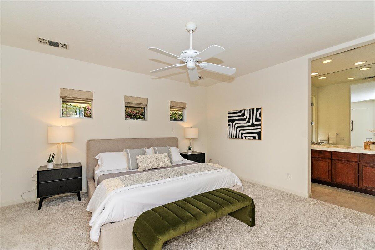 215 Loch Lomond Road Rancho Mirage, CA 92270 - Photo 35 of 57 a bedroom with a bed and window