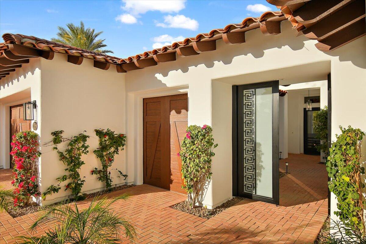 215 Loch Lomond Road Rancho Mirage, CA 92270 - Photo 4 of 57 a front view of a house