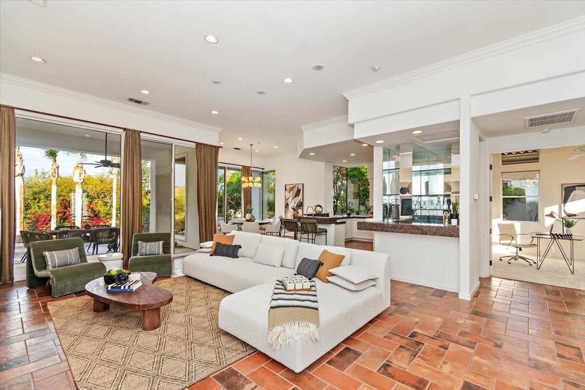 215 Loch Lomond Road Rancho Mirage, CA 92270 - Photo 7 of 57 a living room with furniture and large windows