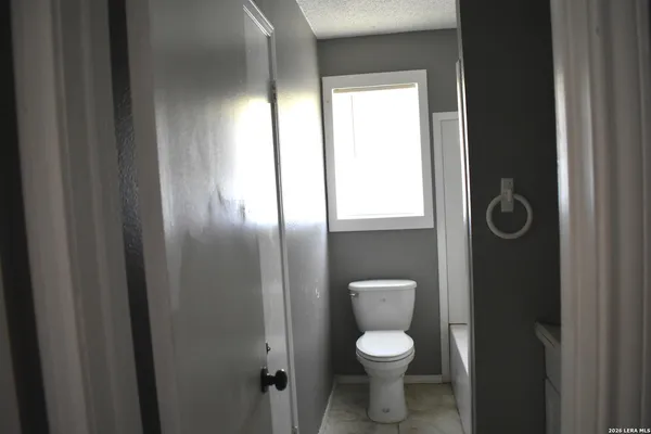 a bathroom with a toilet