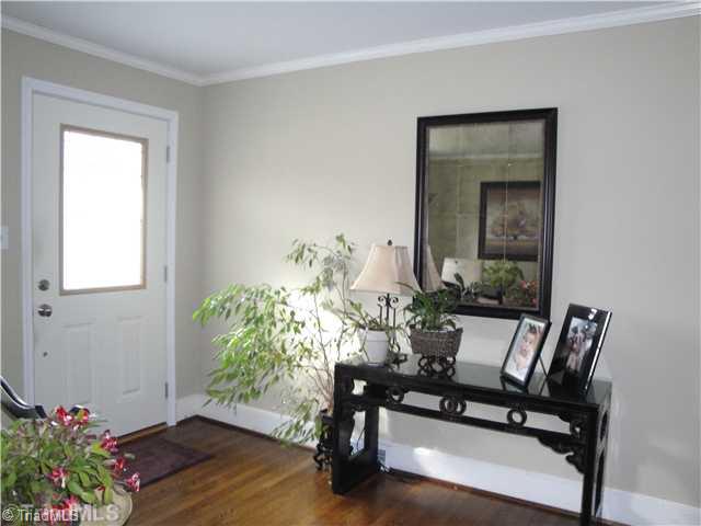 1600 Independence Road Greensboro, NC 27408 - Photo 2 of 10 Entry. The moment you enter the foyer you can see the care this home has received starting with the replaced storm door and front door.