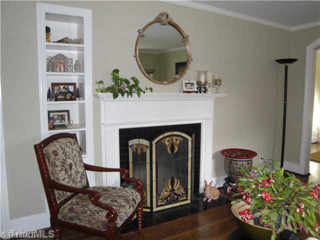 1600 Independence Road Greensboro, NC 27408 - Photo 4 of 10 Living Room. Fireplace in living room with built in shelves