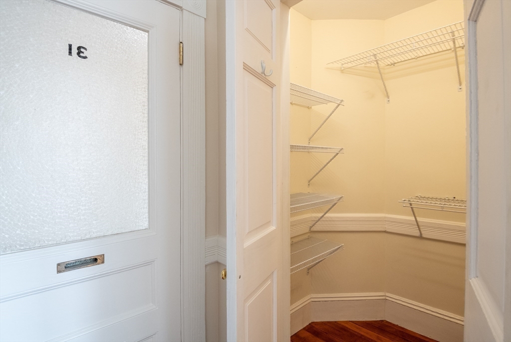 99 Washington Street, Unit 33 Salem, MA 01970 - Photo 13 of 36 a view of an empty walk in closet