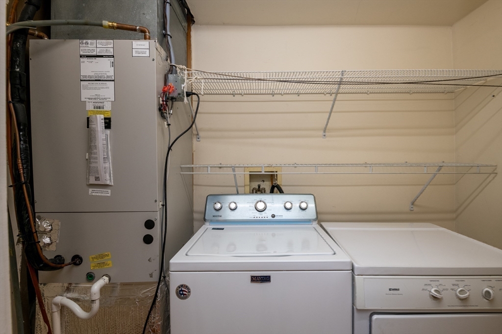 99 Washington Street, Unit 33 Salem, MA 01970 - Photo 33 of 36 a utility room with dryer and washer