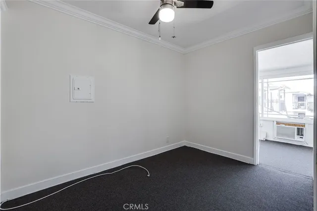 an empty room with a bathroom