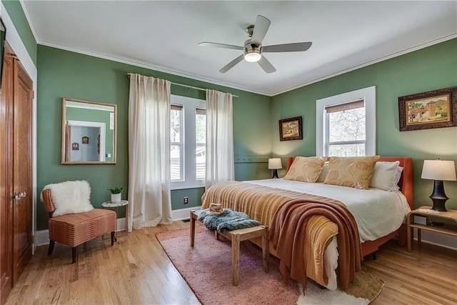 3353 Myrtle Street Hapeville, GA 30354 - Photo 8 of 22 a bedroom with a bed and a chandelier