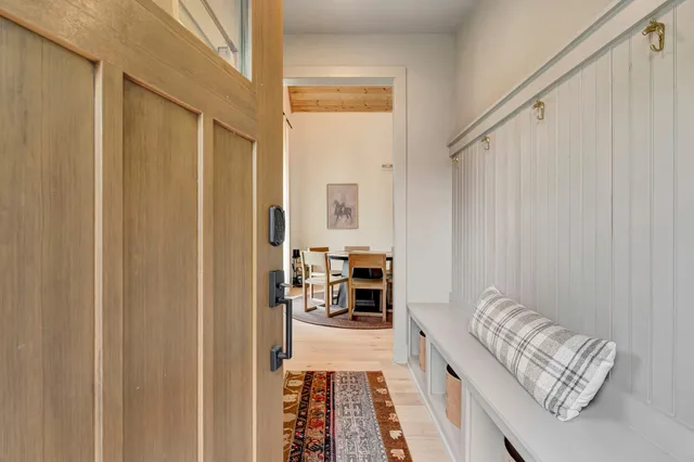 a living room with furniture and a table