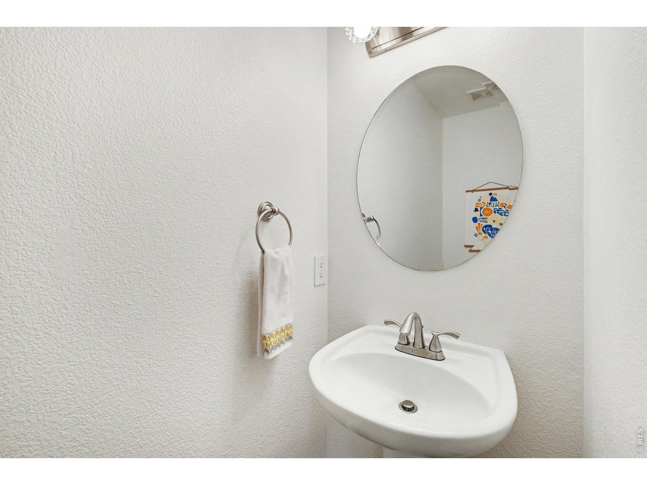 2702 Rigden Parkway, Unit 1 Fort Collins, CO 80525 - Photo 15 of 31 a bathroom with a sink and a mirror
