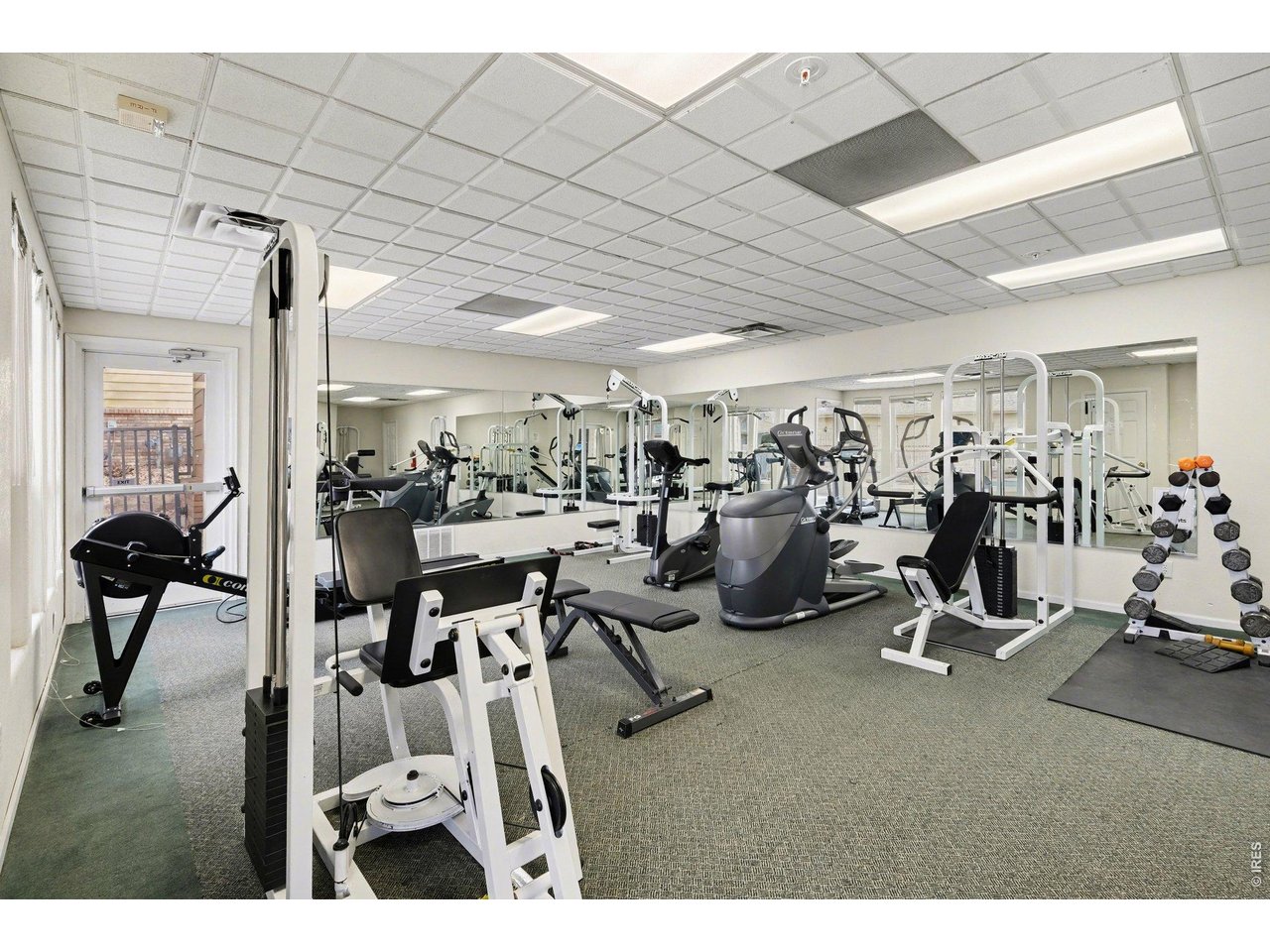 2702 Rigden Parkway, Unit 1 Fort Collins, CO 80525 - Photo 23 of 31 a view of a room with gym equipment