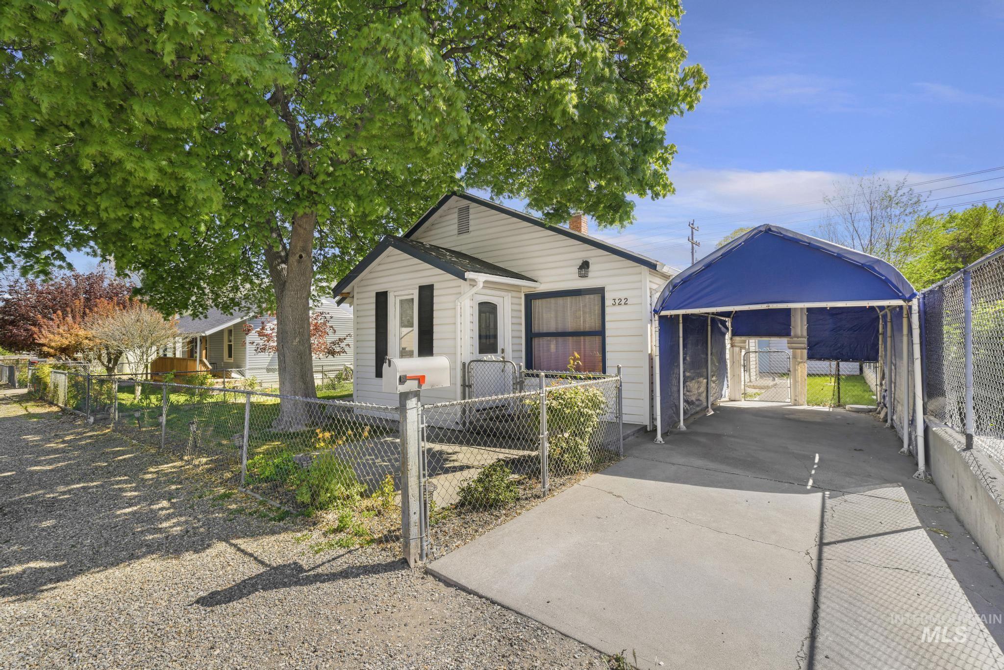 322 Jackson Street Twin Falls, ID 83301 - Photo 33 of 47 Single-story residence featuring white siding and black window shutters