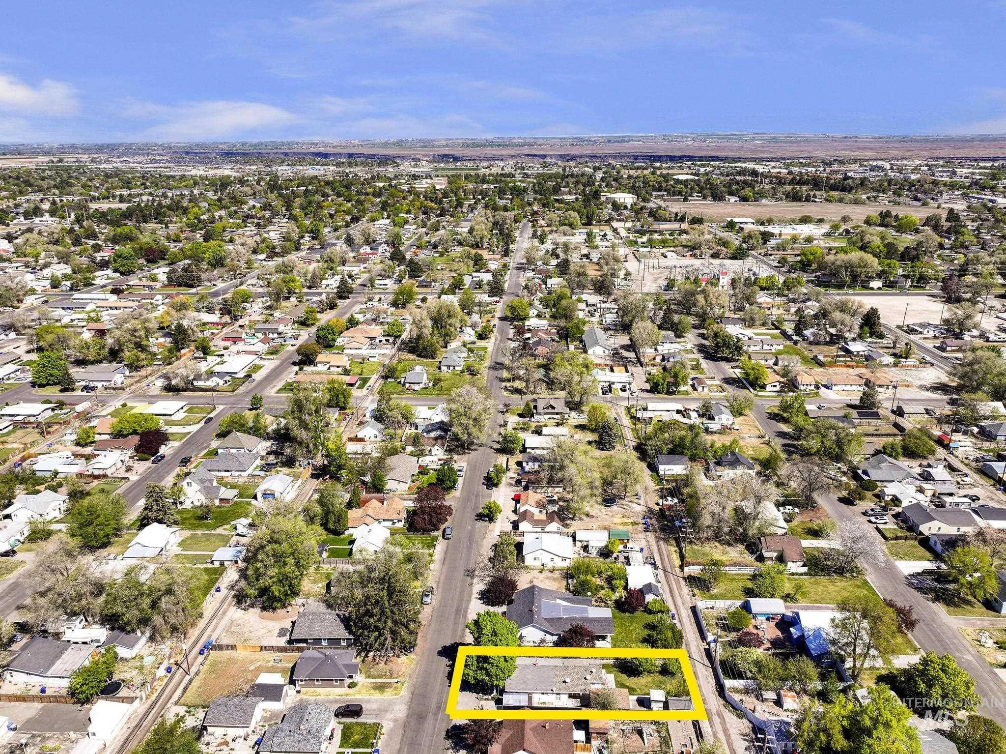 322 Jackson Street Twin Falls, ID 83301 - Photo 45 of 47 Aerial perspective of a developed residential area with numerous single-story homes and mature trees