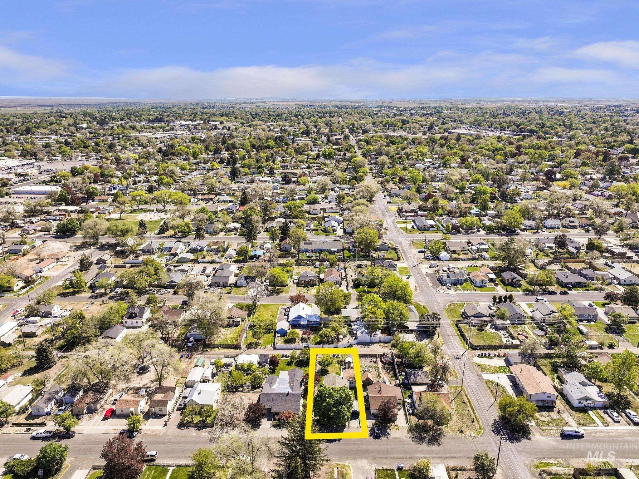 322 Jackson Street Twin Falls, ID 83301 - Photo 46 of 47 Aerial perspective showcasing a residential neighborhood with tree-lined streets