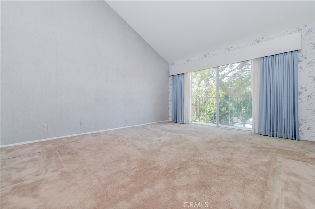7 Del Rey, Unit 10 Irvine, CA 92612 - Photo 36 of 75 Expansive Primary En-Suite with Balcony overlooking community pool and green belt