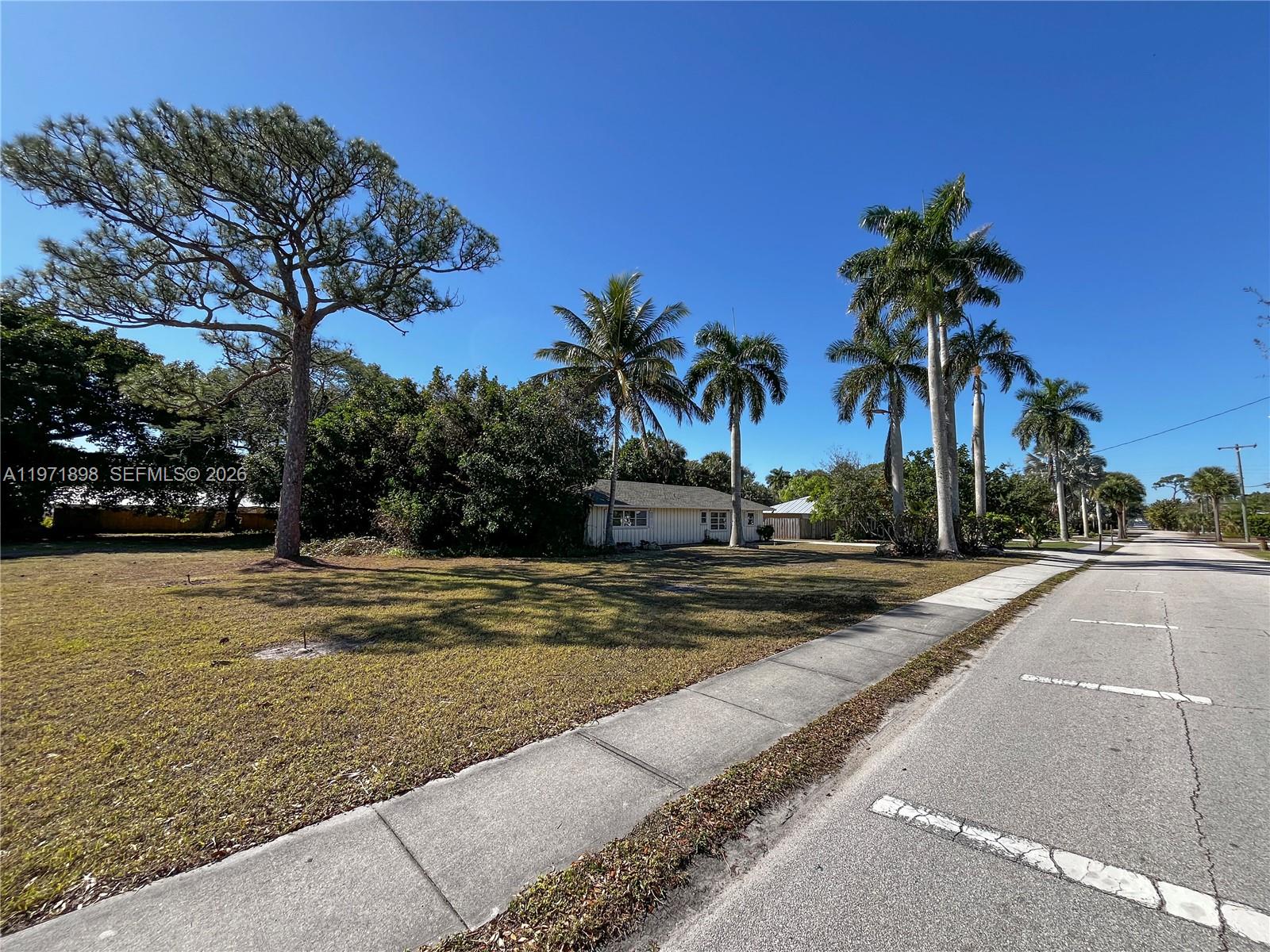 325 South Manor Drive Stuart, FL 34994 - Photo 25 of 27 Left Side
