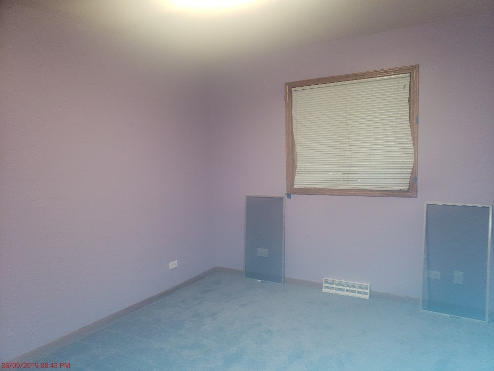 1493 North River Road Oregon, IL 61061 - Photo 5 of 9 an empty room with a window