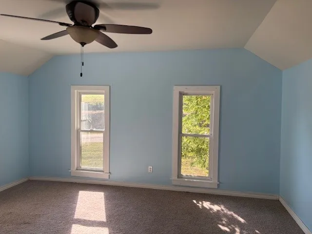 a view of livingroom with furniture and window