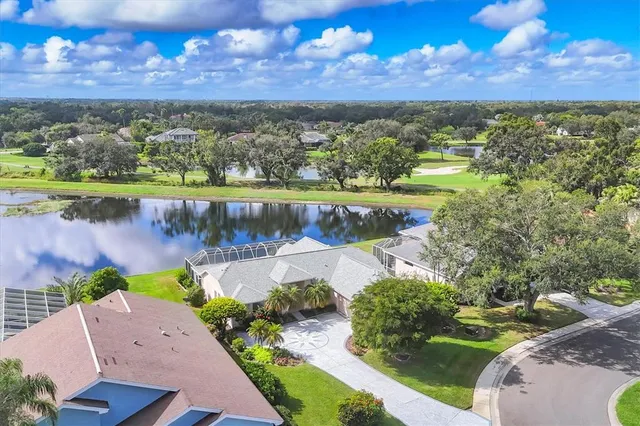 a view of a lake with a yard