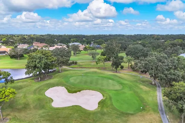a view of a golf course with a garden