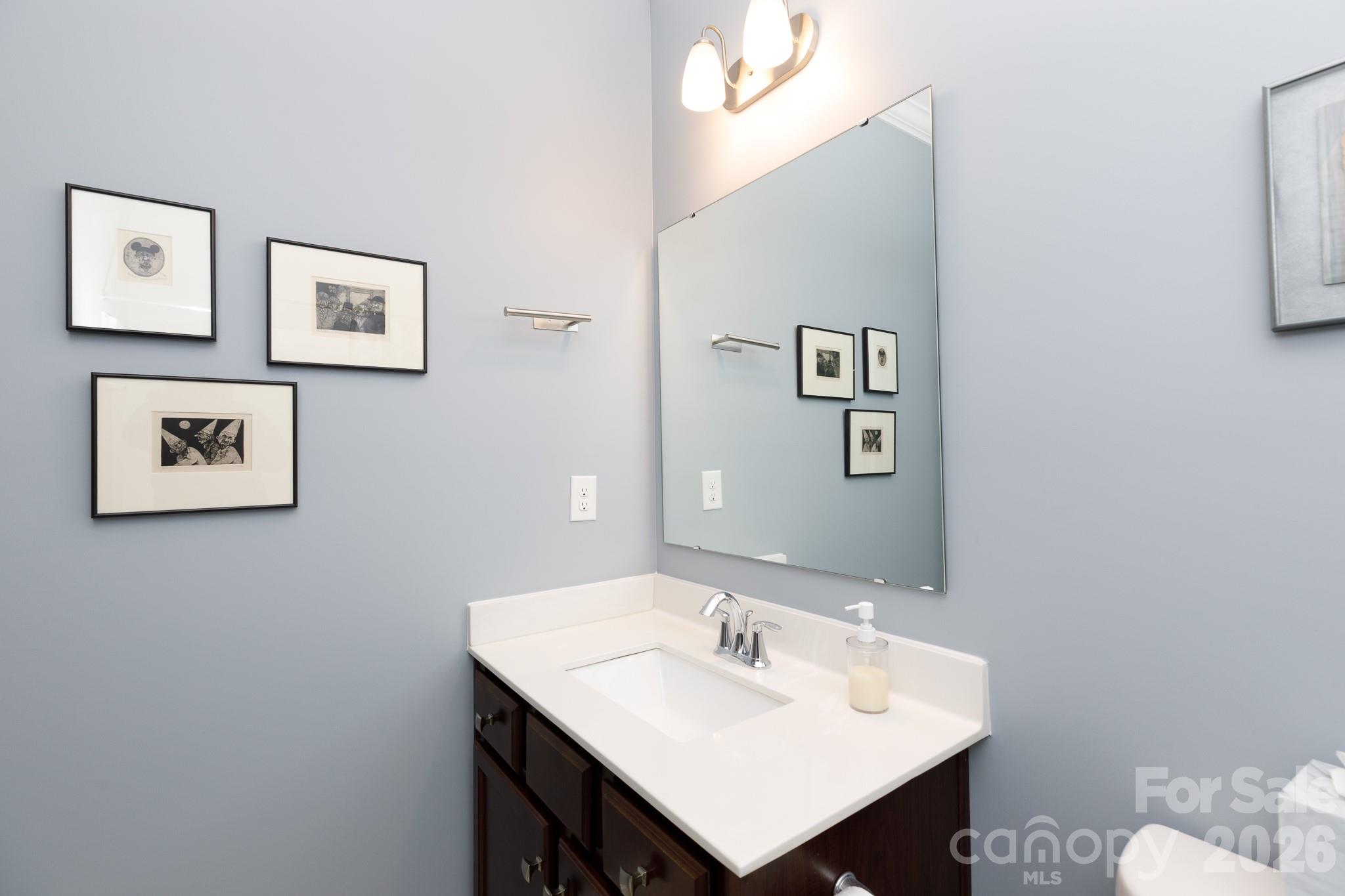 40308 Crooked Stick Lane Lancaster, SC 29720 - Photo 28 of 46 a bathroom with a sink and a mirror