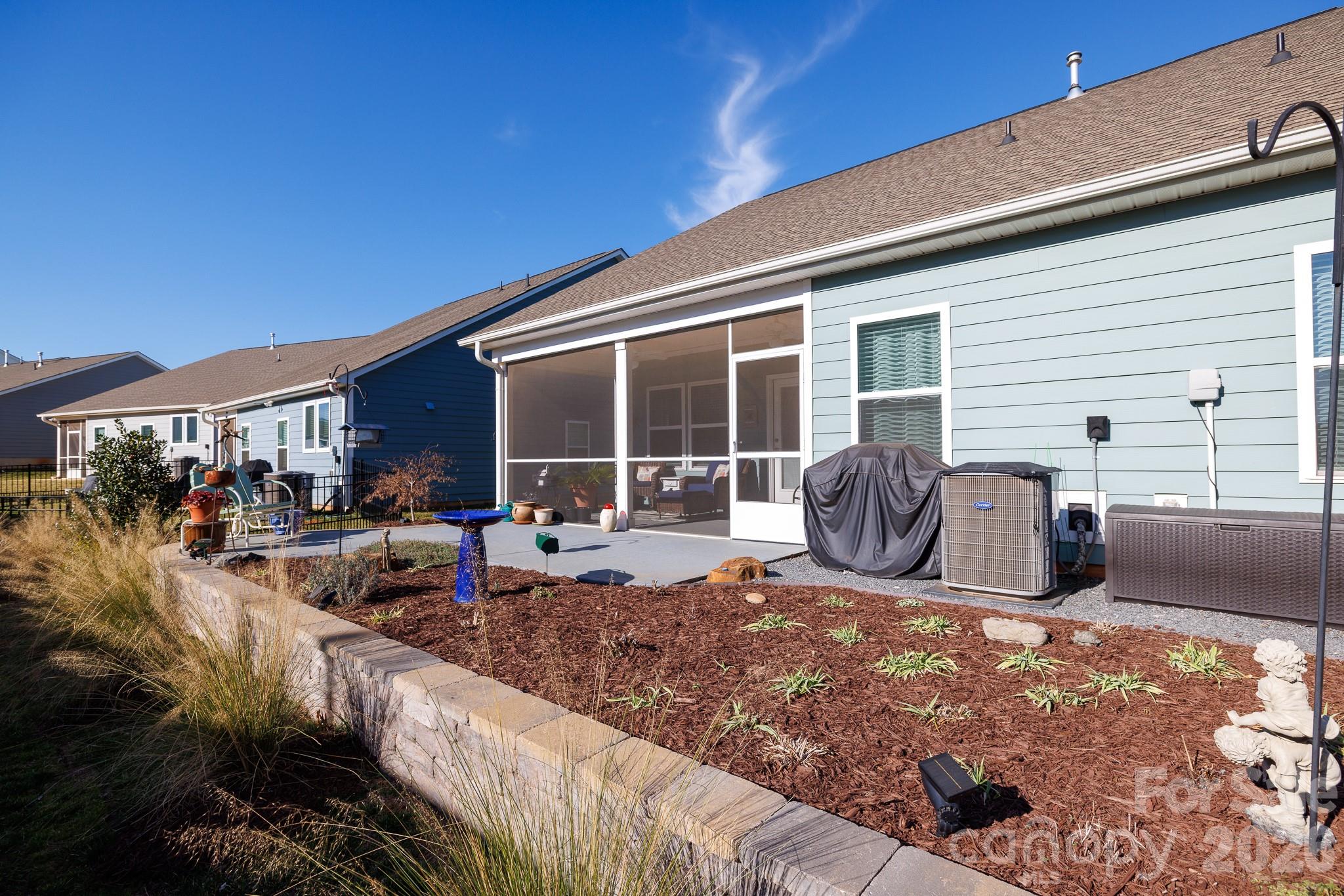 40308 Crooked Stick Lane Lancaster, SC 29720 - Photo 32 of 46 a view of a house with backyard porch and furniture