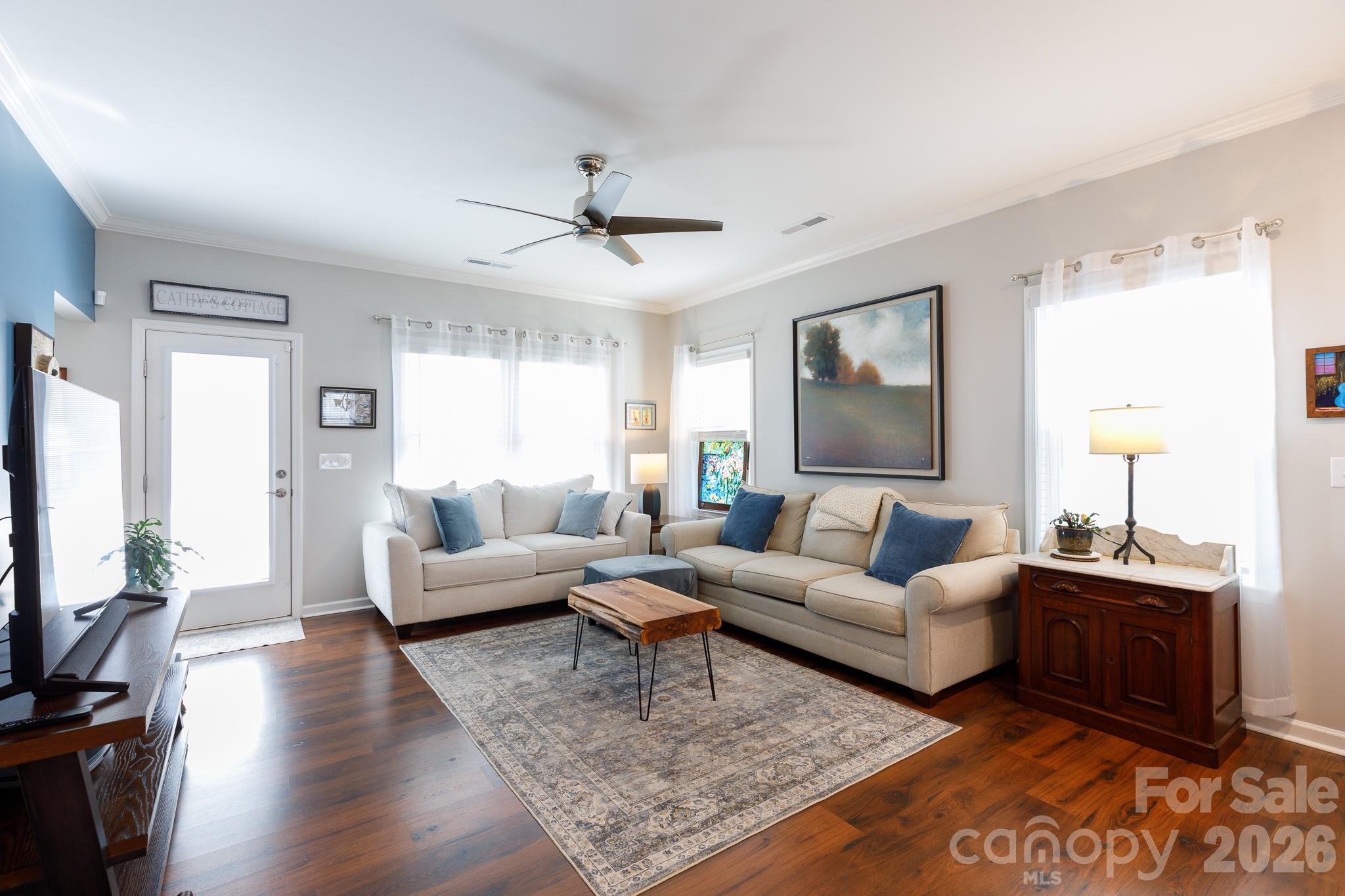 40308 Crooked Stick Lane Lancaster, SC 29720 - Photo 6 of 46 a living room with furniture flat screen tv and window