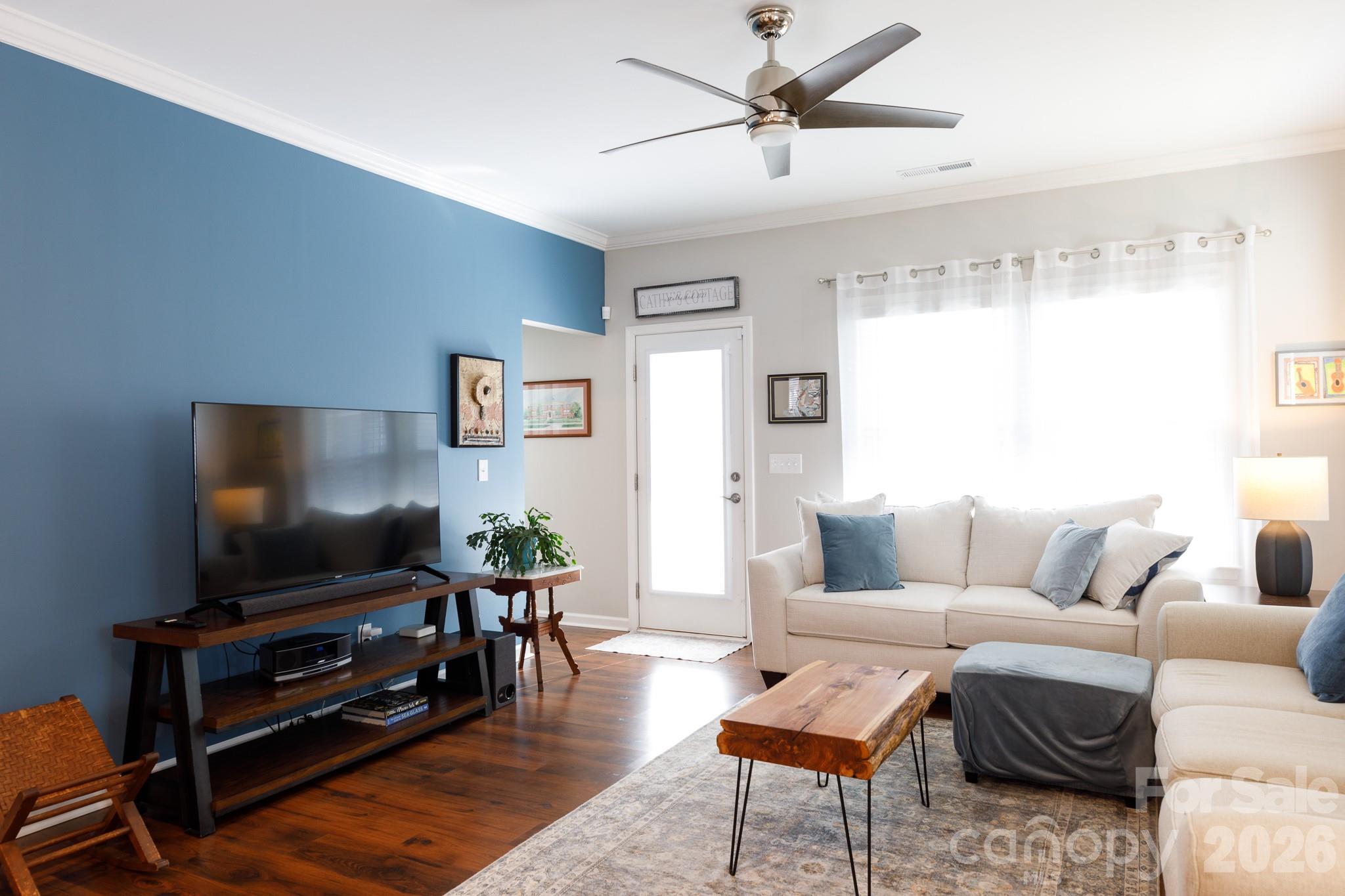 40308 Crooked Stick Lane Lancaster, SC 29720 - Photo 7 of 46 a living room with furniture and a flat screen tv