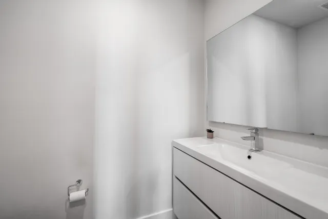 a bathroom with a sink and a vanity