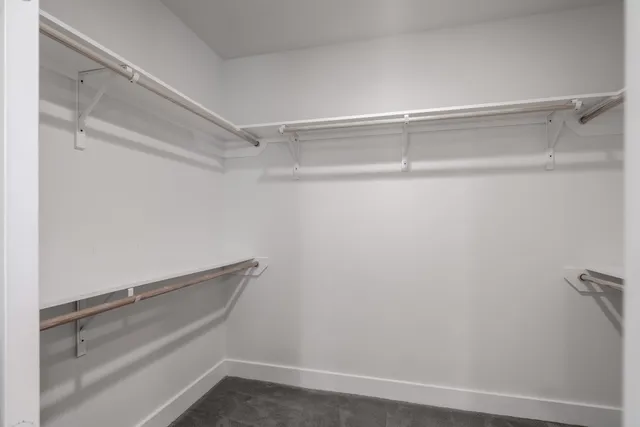 a view of an empty walk in closet