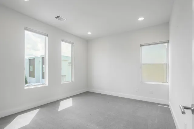 an empty room with windows
