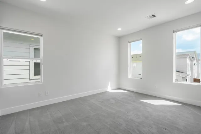 an empty room with windows