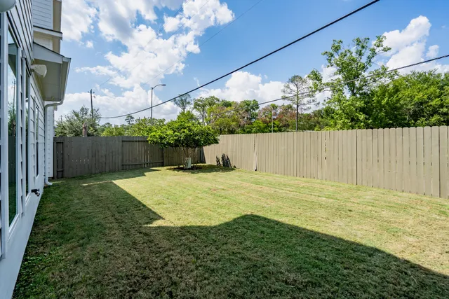 a view of a house with swimming pool and porch