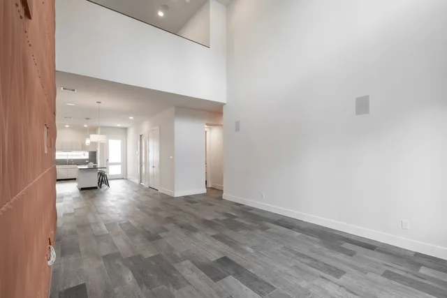 a view of a room with a sink and a toilet