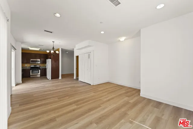 a view of a room with closet and a window