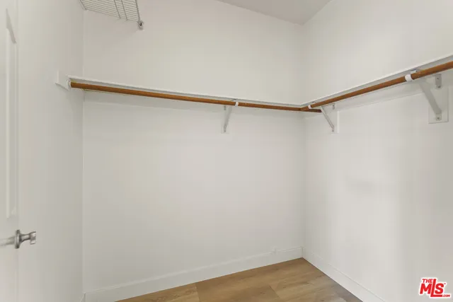 a view of small space with racks on the wall