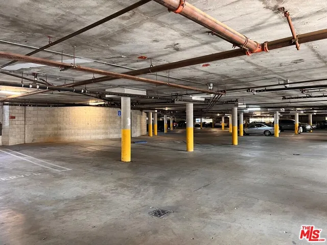a bathroom with a sink and shower