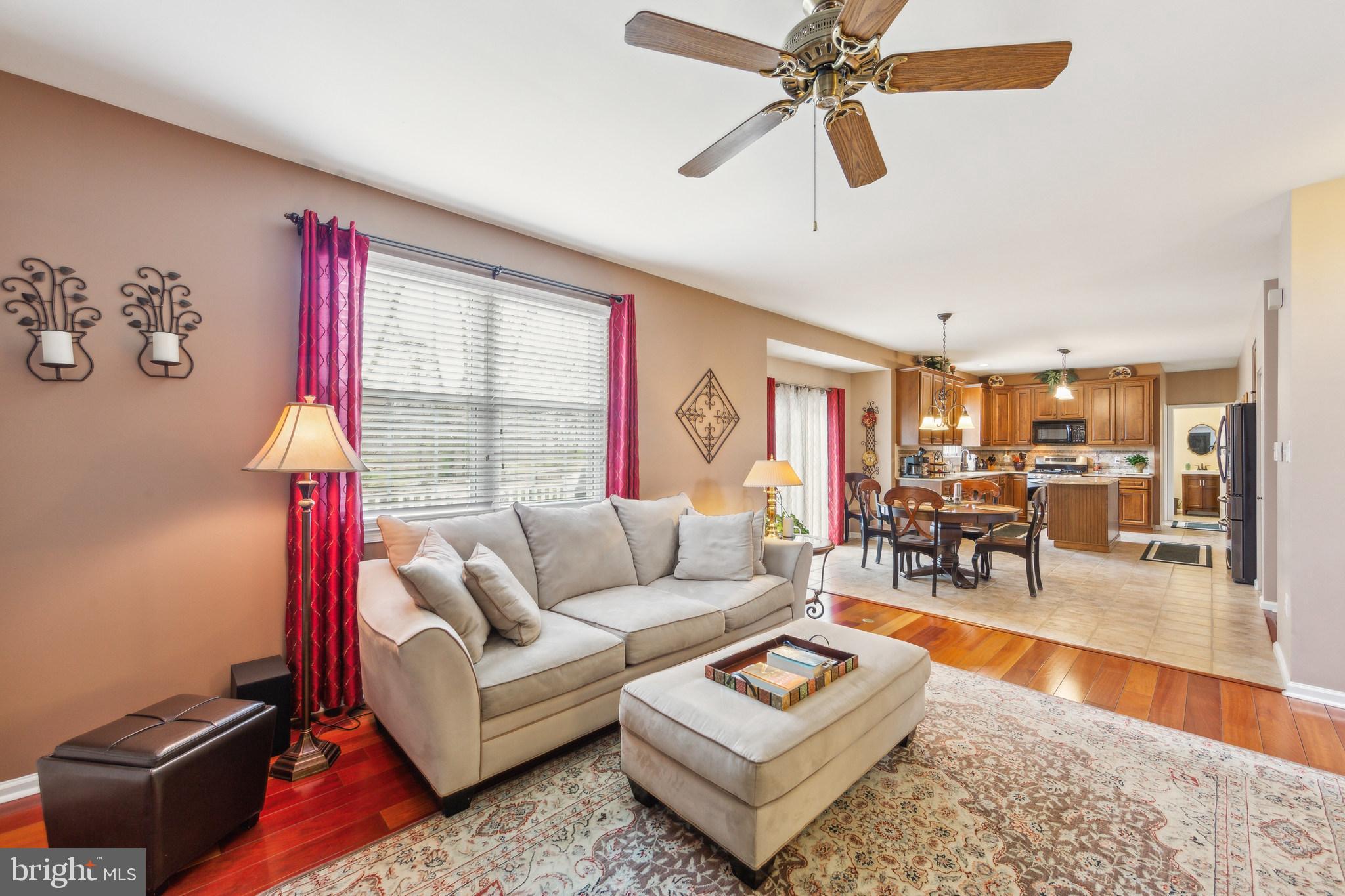 2902 Rosa Lane Norristown, PA 19403 - Photo 12 of 38 a living room with furniture and a wooden floor