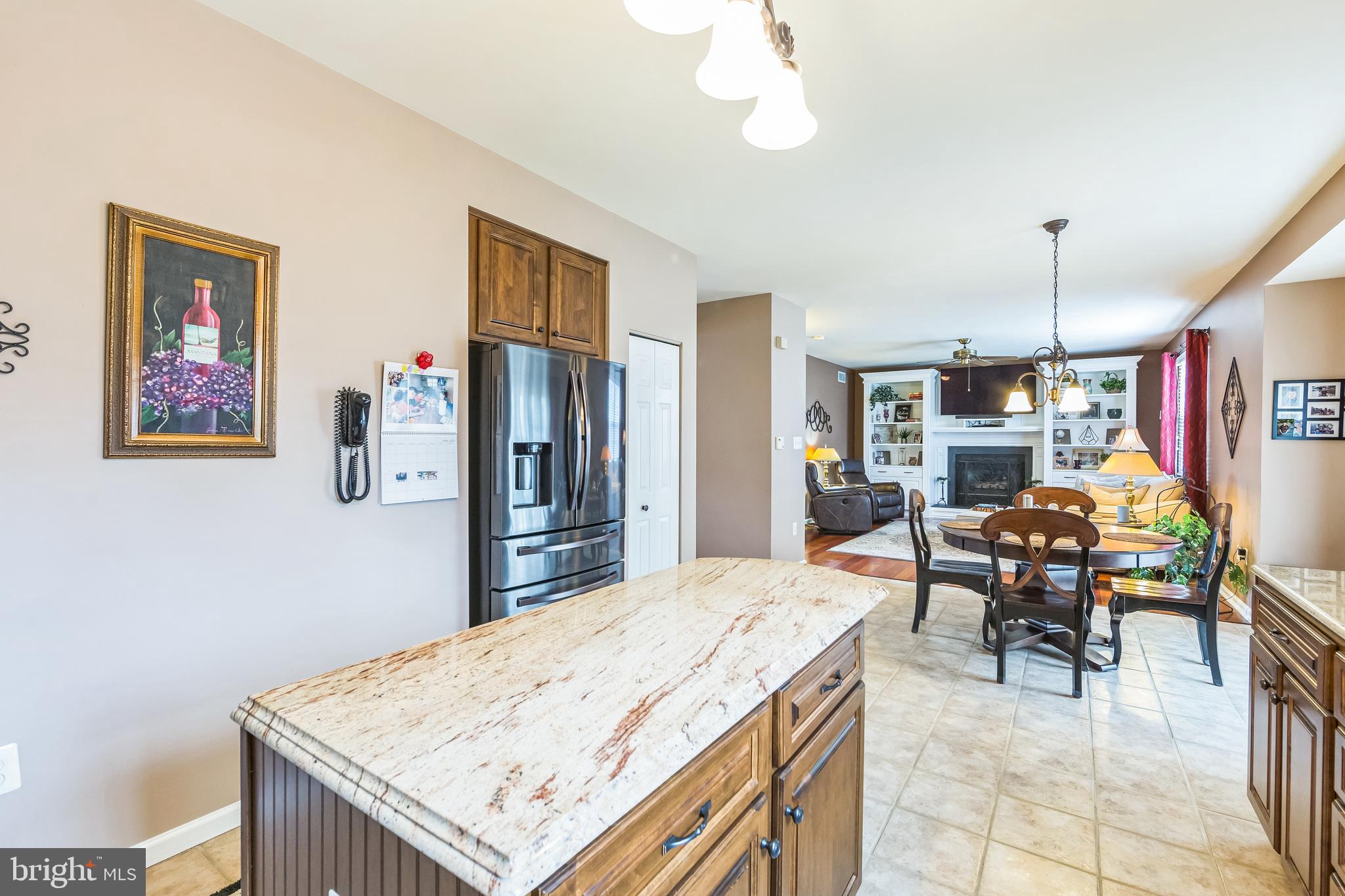 2902 Rosa Lane Norristown, PA 19403 - Photo 26 of 38 a open kitchen with stainless steel appliances granite countertop a stove refrigerator and cabinets