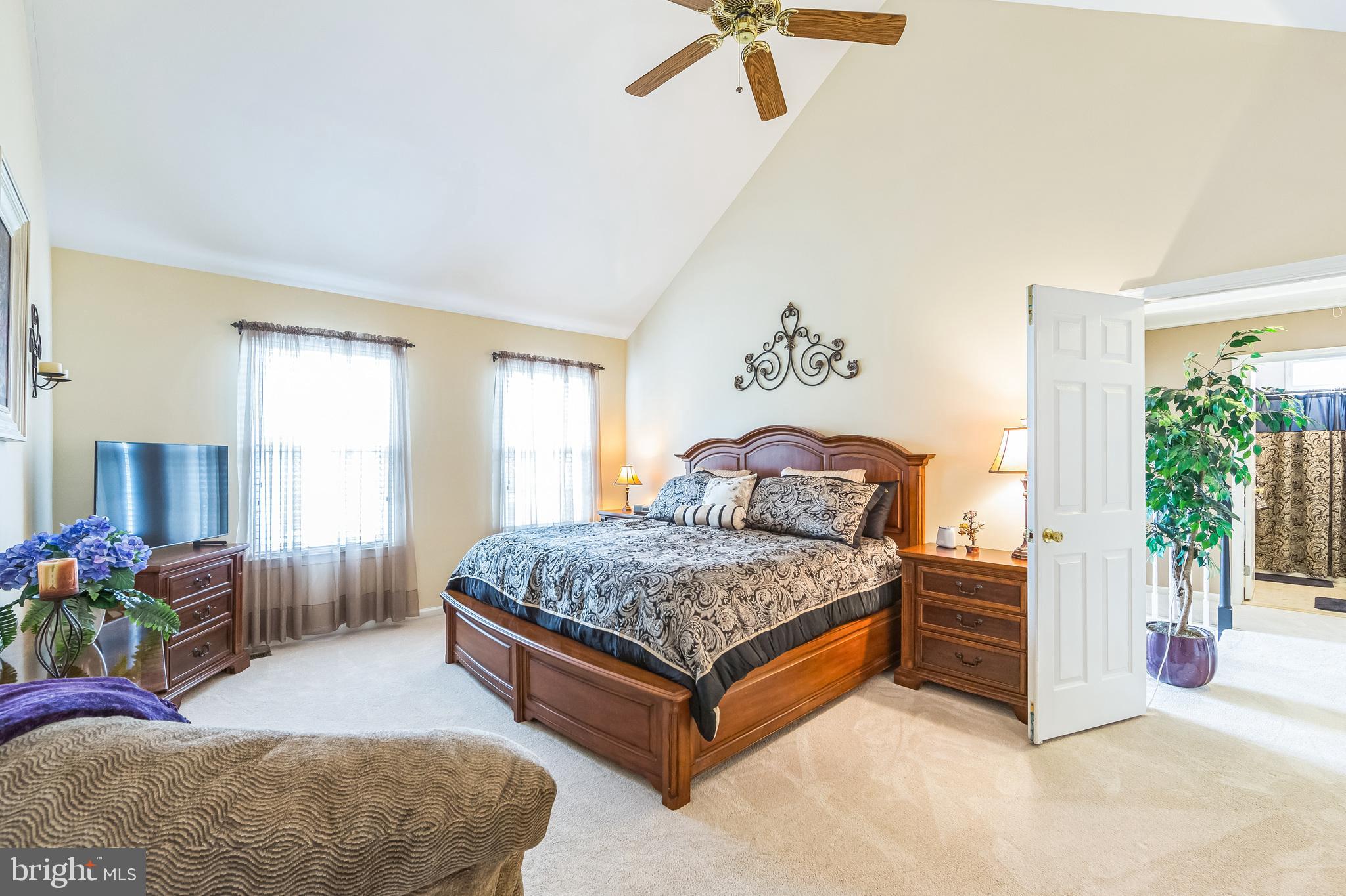 2902 Rosa Lane Norristown, PA 19403 - Photo 28 of 38 a bedroom with a bed and potted plant