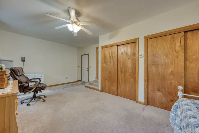 a view of a livingroom with a workspace