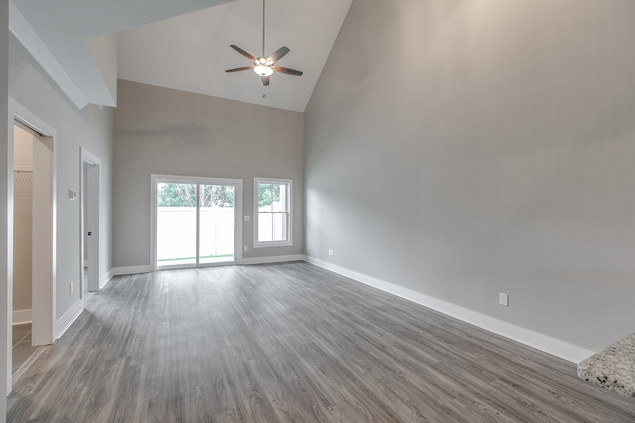 524 Haviture Way Murfreesboro, TN 37129 - Photo 13 of 50 wooden floor in an empty room with a window