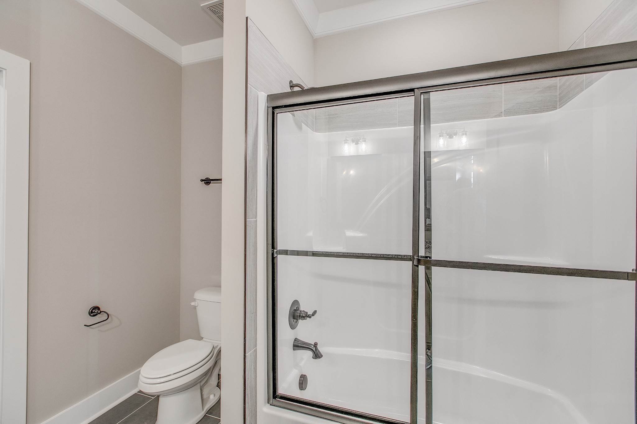 524 Haviture Way Murfreesboro, TN 37129 - Photo 19 of 50 a bathroom with a glass shower door
