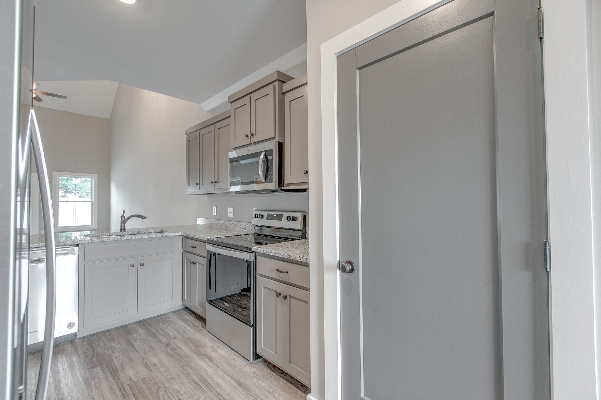 524 Haviture Way Murfreesboro, TN 37129 - Photo 9 of 50 a kitchen with a sink cabinets stainless steel appliances and a window