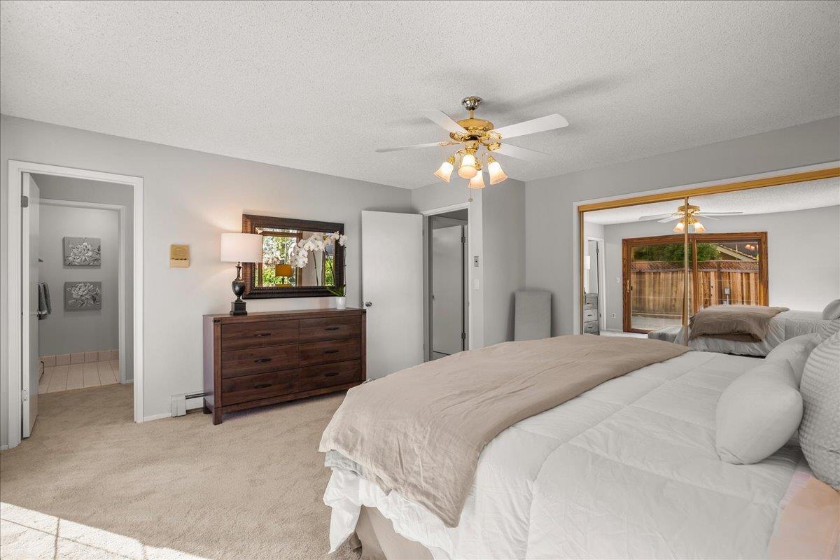 1816 Dry Creek Road San Jose, CA 95124 - Photo 18 of 37 a bedroom with a bed and a dresser