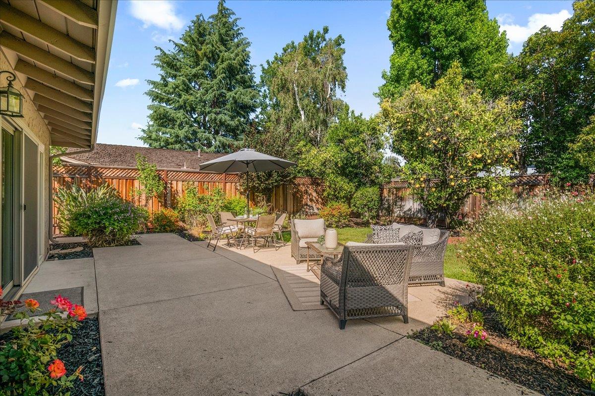 1816 Dry Creek Road San Jose, CA 95124 - Photo 26 of 37 a view of a patio with table and chairs and potted plants