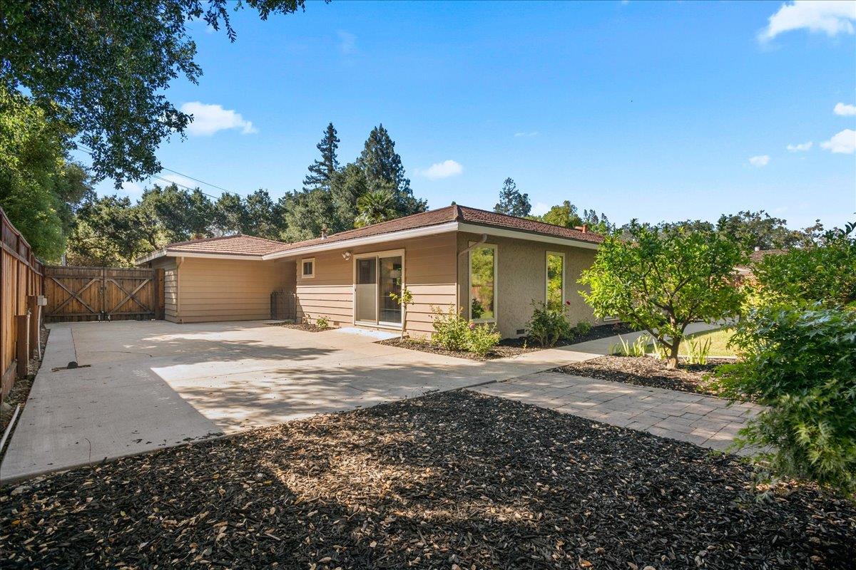 1816 Dry Creek Road San Jose, CA 95124 - Photo 30 of 37 a view of a house with a yard and large tree