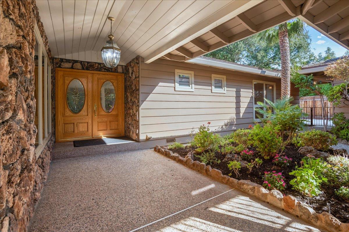 1816 Dry Creek Road San Jose, CA 95124 - Photo 3 of 37 a view of a house with porch and garden